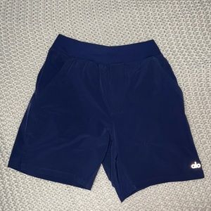 Alo 7” Repetition Short in color True Navy and in size small.